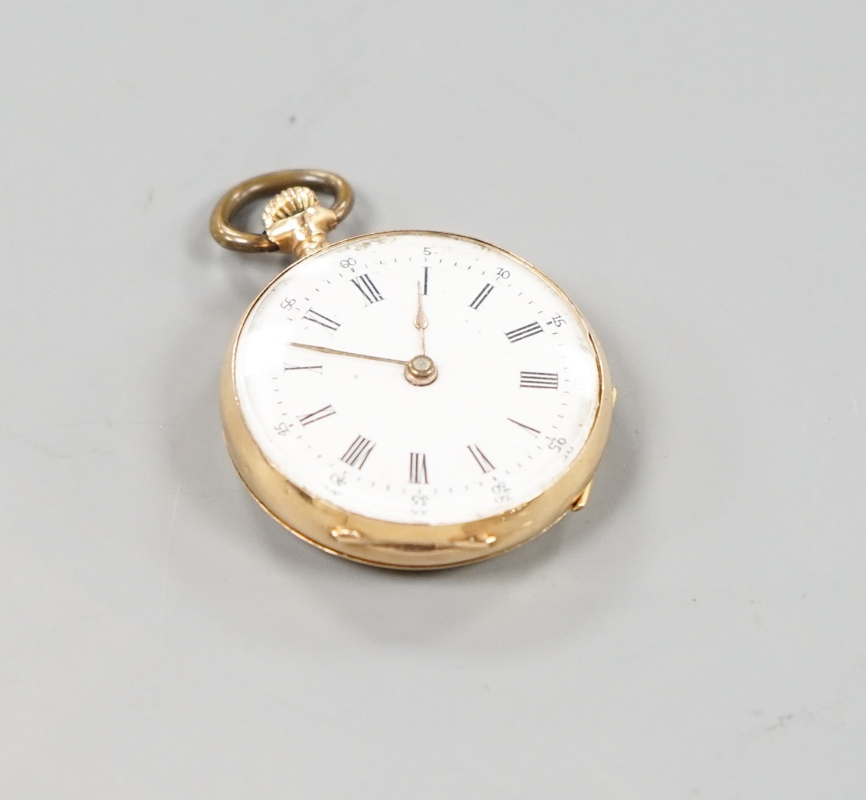 A continental 18k and enamelled open face keyless fob watch, decorated with a young boy hunting, case diameter 30mm